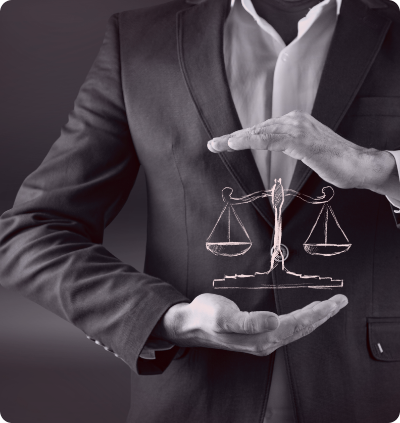 A person in a suit holds an illustrated scale of justice between their hands.
